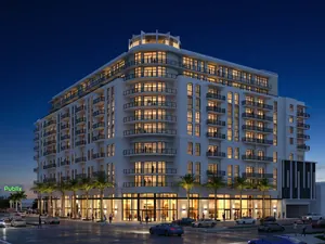 Rendering of Banyan House, a 10-story multifamily community with ground-floor retail in Miami